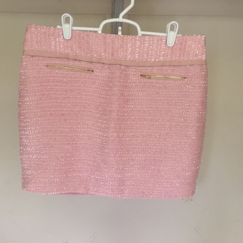 Pink mini skirt with gold accent zippers